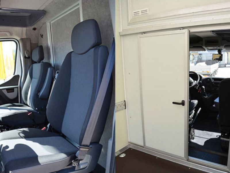 Průchod mezi kabinou řidiče a nákladovým prostorem